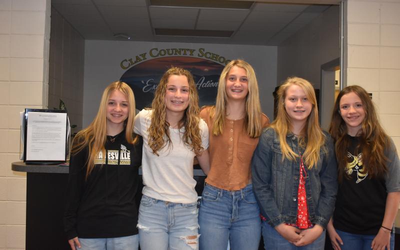 From left, Khylei Alberta, Savannah Burch, Sydney Greenstone, Madison Parker and Annie Godfrey are recognized for their accomplishments in track.