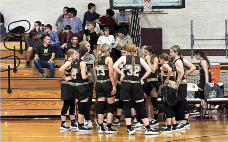 Hayesville Middle School Lady Jackets prepare their ultimate strategies during game.