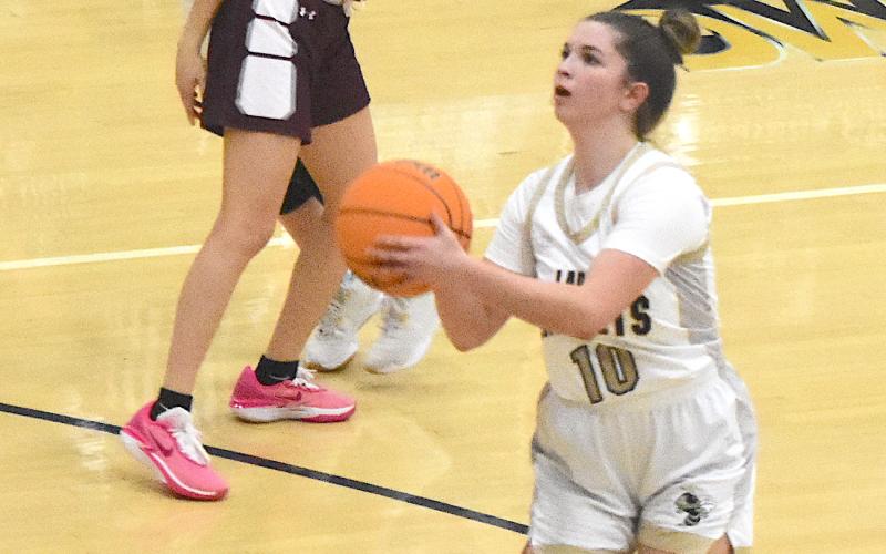 Gary Corsair • Clay County Progress Hayesville's Bryleigh Krieger, No. 10, lines up her jump shot after finding a hole in the Swain County defense.