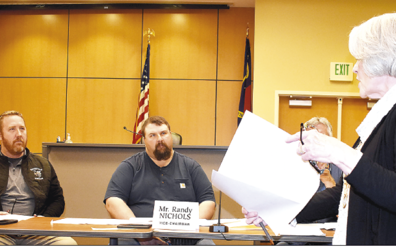 Becky Long • Clay County Progress Commission Chairman Rob Peck, Vice-Chair Randy Nichols and Commissioner Dwight Penland follow along with County Attorney Merinda Woody as she outlines, and recommends, right of way agreements between the county and N.C. Department of Transportation.