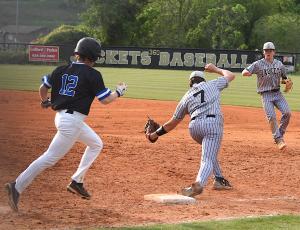 Gary Corsair • Clay County Progress Hayesville's Cade Caruso has the ball and the bag but the Bethany Community runner was declared safe on this seventh-inning play.